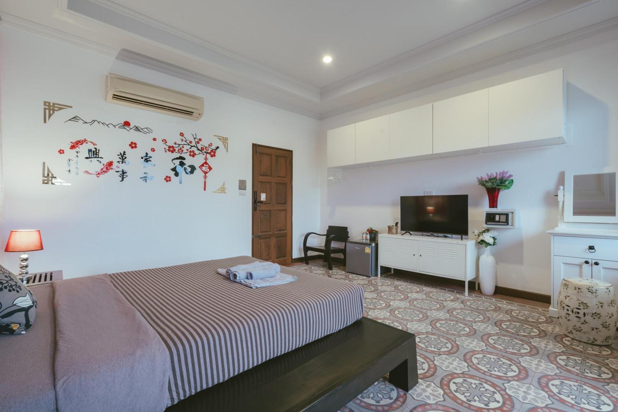 Botan Boutique Hotel Patong Exterior photo